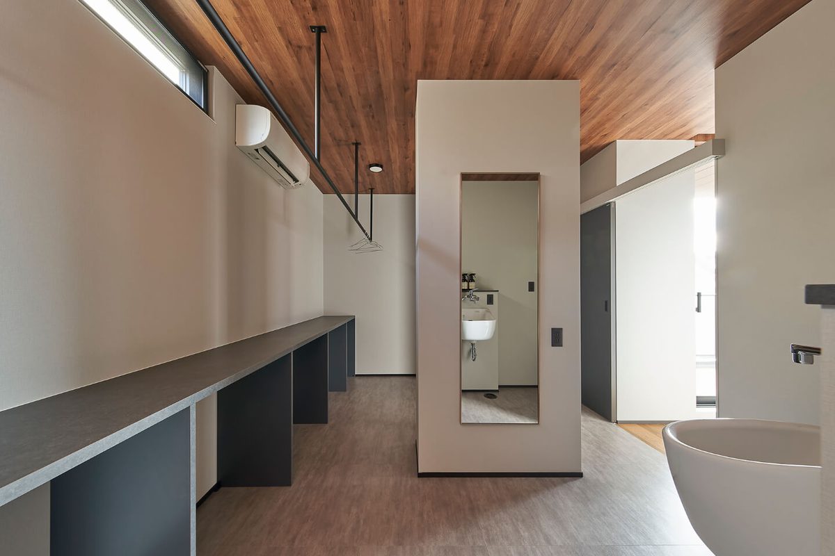 Long counter and storage on the left, washbasin on the right